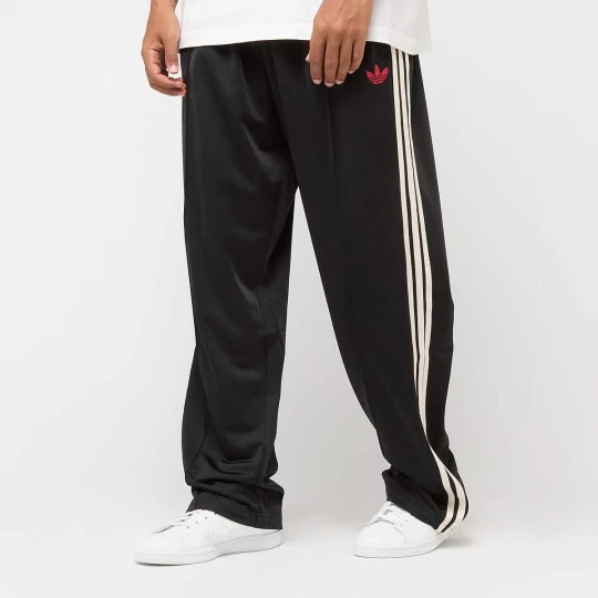 Zdjęcie produktu Firebird Adicolor Baggy Fit Trackpants adidas Originals czarny