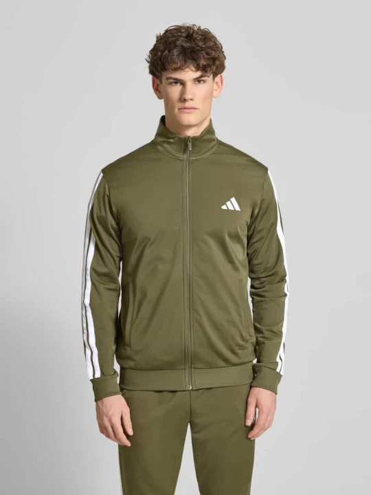 Zdjęcie produktu Garnitur z dzianiny dresowej o kroju regular fit z paskami w kontrastowym kolorze Adidas