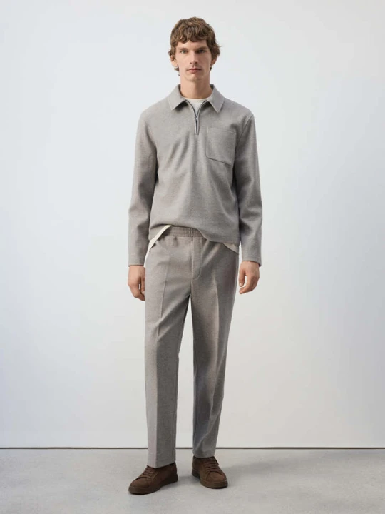Zdjęcie produktu GŁADKIE SPODNIE JOGGER REGULAR FIT jasny / pastelowy szary - Mężczyzna - MANGO MAN