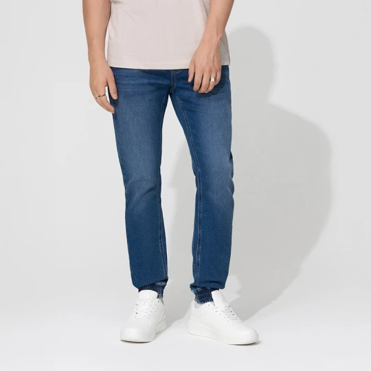Zdjęcie produktu Granatowe jeansowe joggery z przetarciami House niebieski
