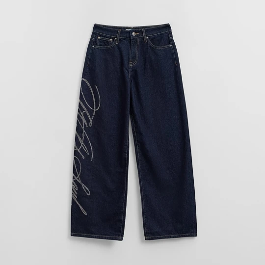 Zdjęcie produktu Granatowe jeansy baggy fit z napisem z dżetów House niebieski