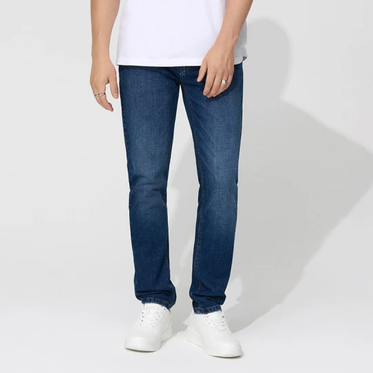 Zdjęcie produktu Granatowe jeansy slim fit z efektem sprania House
