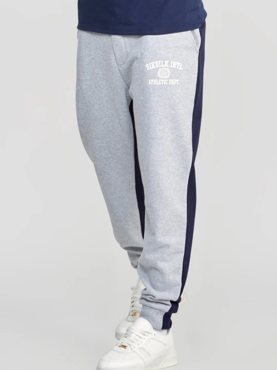 Zdjęcie produktu Granatowe spodnie dresowe męskie z kontrastem SikSilk szary