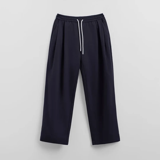 Zdjęcie produktu Granatowe spodnie dresowe super baggy House