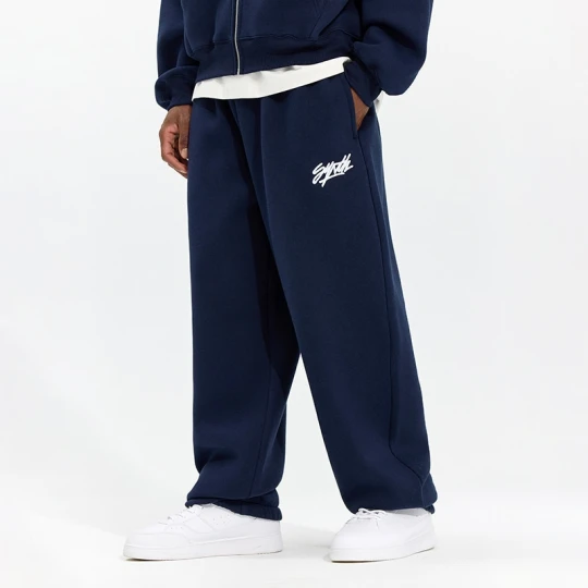 Zdjęcie produktu Granatowe spodnie dresowe super baggy z haftem House
