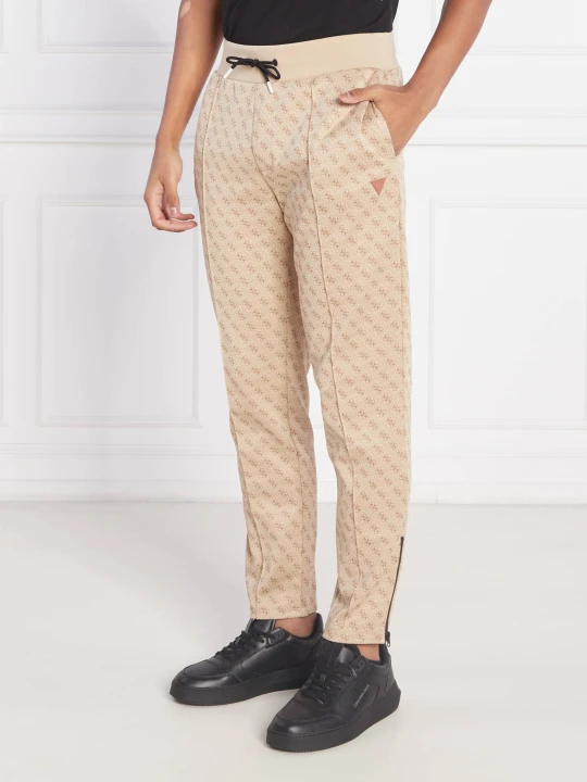 Zdjęcie produktu GUESS ACTIVE Spodnie dresowe KORBIN | Regular Fit beżowy