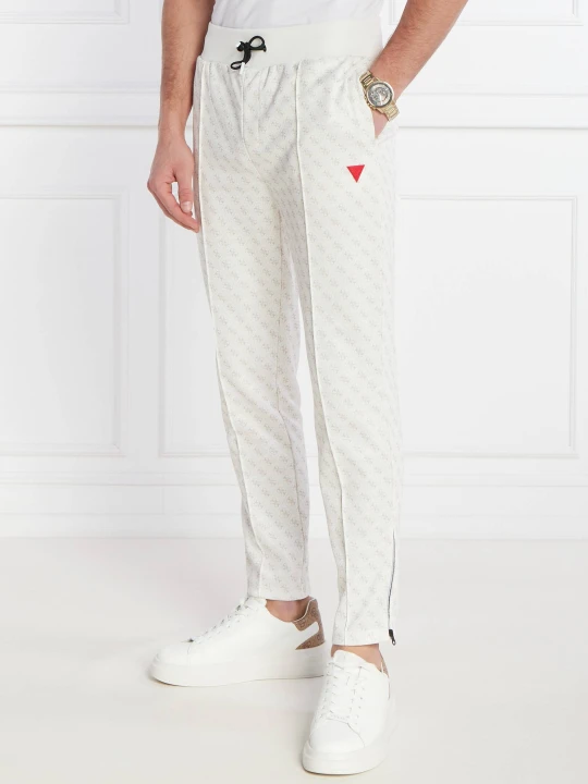 Zdjęcie produktu GUESS ACTIVE Spodnie dresowe KORBIN | Regular Fit ecru