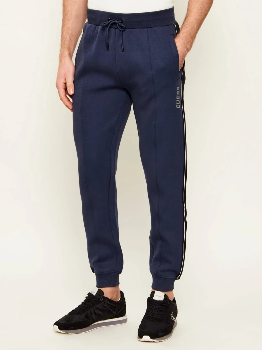 Zdjęcie produktu GUESS ACTIVE Spodnie dresowe Mickey | Regular Fit granatowy