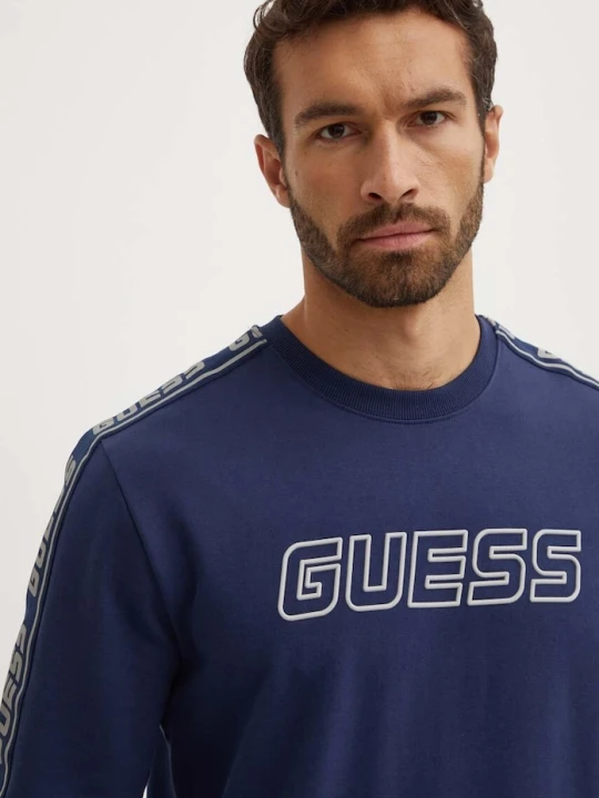 Zdjęcie produktu Guess bluza męska z bawełną ARLO granatowy