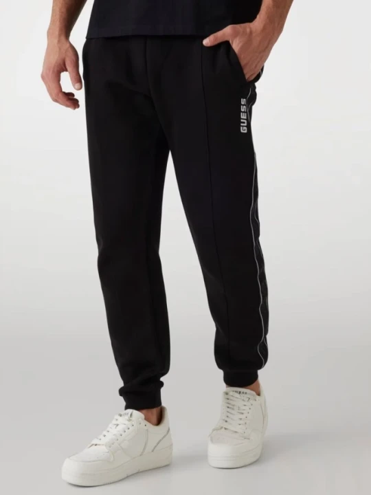Zdjęcie produktu GUESS Czarne męskie spodnie dresowe z lampasami Mickey, Rozmiar L