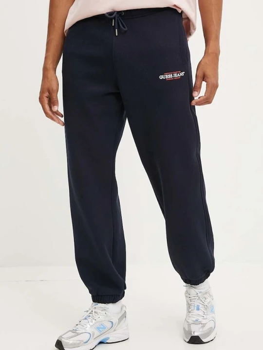 Zdjęcie produktu Guess Jeans spodnie dresowe granatowy