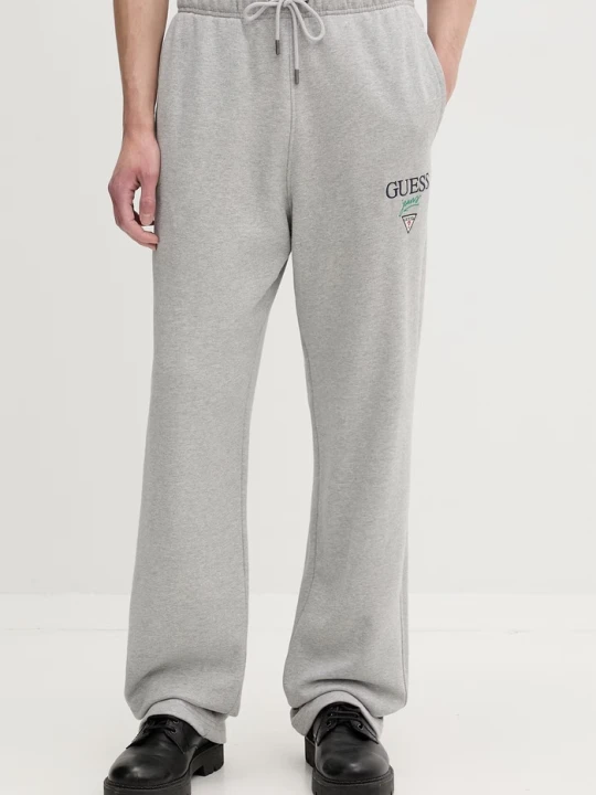 Zdjęcie produktu Guess Jeans spodnie dresowe męskie bawełniane szary