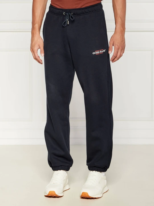 Zdjęcie produktu Guess Jeans Spodnie dresowe | Regular Fit granatowy