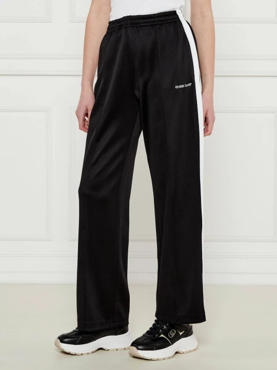 Zdjęcie produktu Guess Jeans Spodnie dresowe TRICOT | Relaxed fit czarny