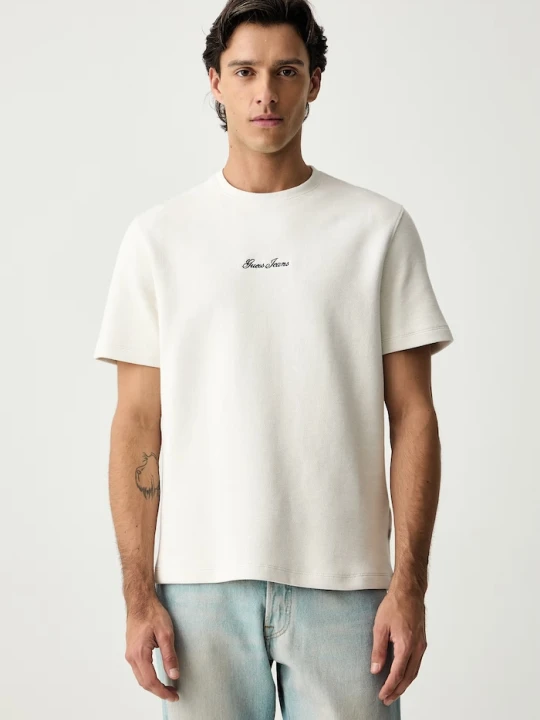 Zdjęcie produktu Guess Jeans T-shirt męski z bawełną beżowy