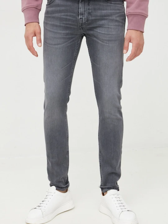 Zdjęcie produktu Guess jeansy CHRIS szary