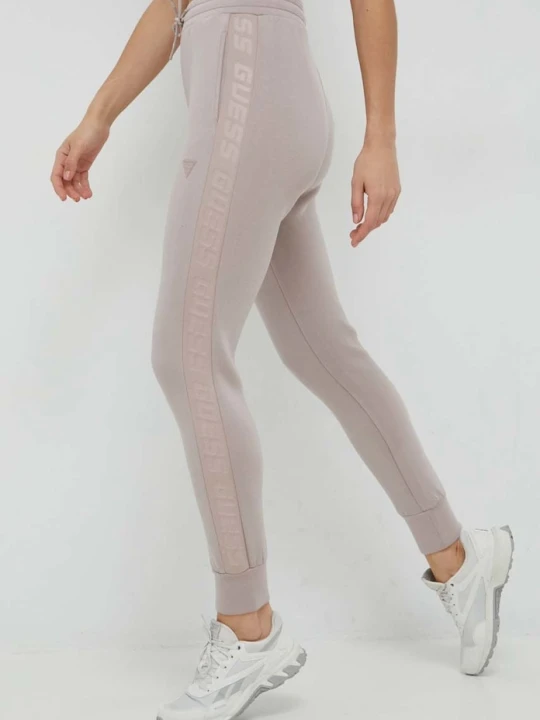 Zdjęcie produktu Guess spodnie dresowe damskie z wiskozą ALLIE fioletowy