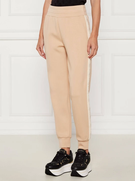 Zdjęcie produktu GUESS Spodnie dresowe NEW VICTOIRE | Regular Fit beżowy