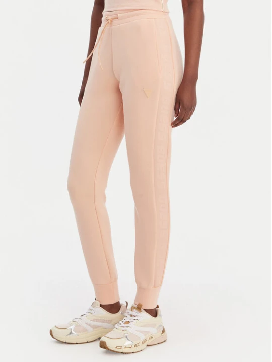 Zdjęcie produktu Guess Spodnie dresowe V2YB18 K7UW2 Pomarańczowy Regular Fit