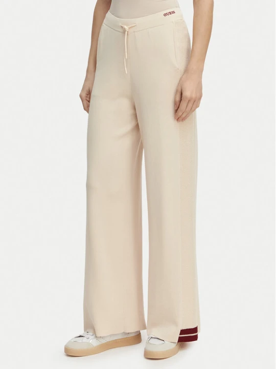 Zdjęcie produktu Guess Spodnie dresowe V6GB06 Z0651 Beżowy Wide Leg