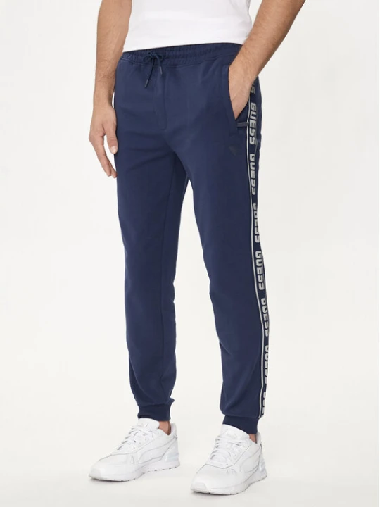 Zdjęcie produktu Guess Spodnie dresowe Z2YB19 K6ZS1 Granatowy Regular Fit