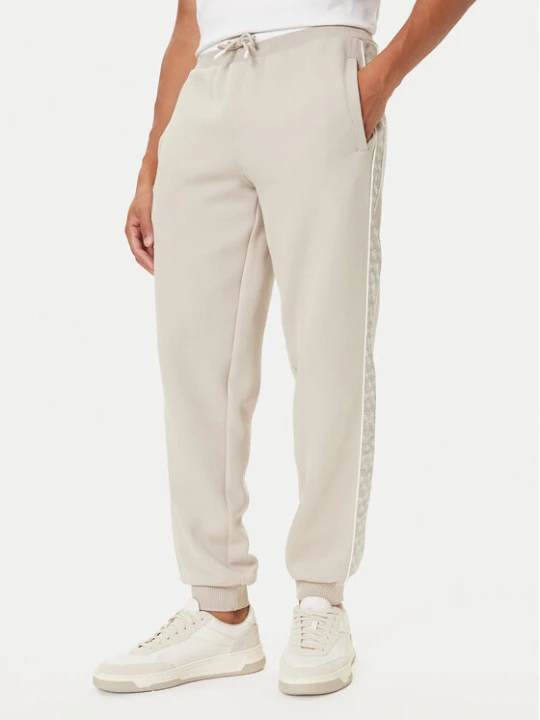 Zdjęcie produktu Guess Spodnie dresowe Z5BB18 KB3P2 Beżowy Regular Fit