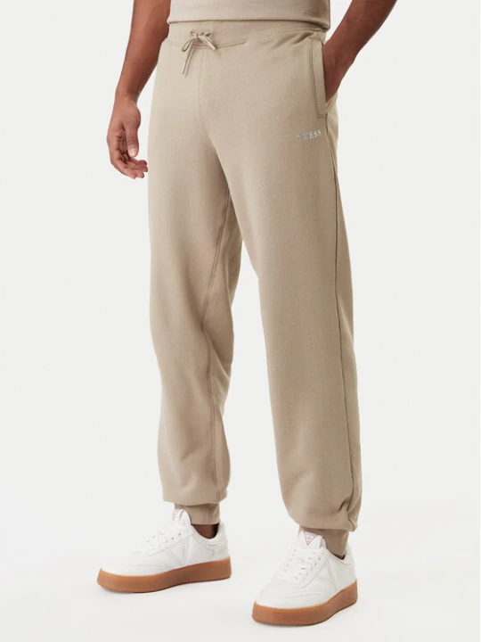 Zdjęcie produktu Guess Spodnie dresowe Z6RB12 KAIJ1 Beżowy Regular Fit