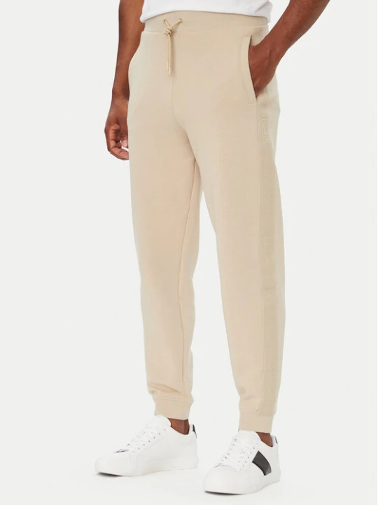 Zdjęcie produktu Guess Spodnie dresowe Z6YB13 K4965 Beżowy Regular Fit