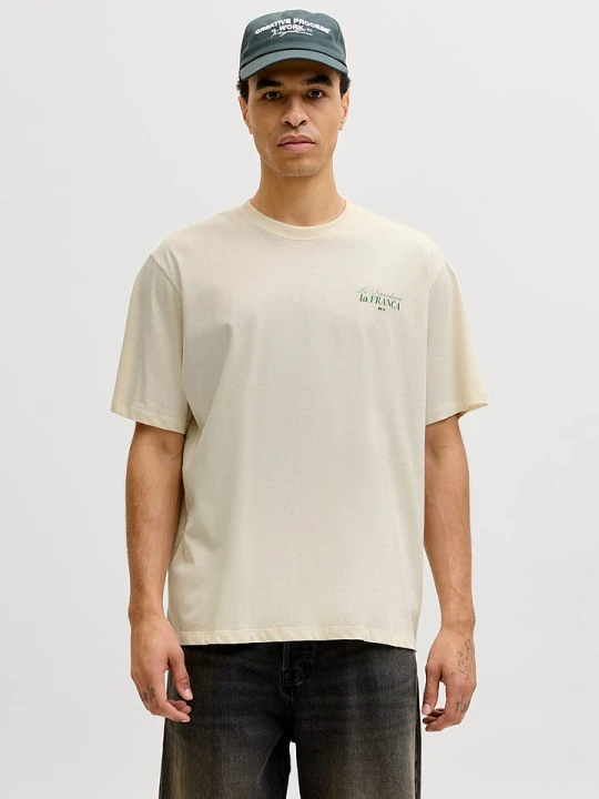 Zdjęcie produktu Jack & Jones Koszulka "Paradise" w kolorze kremowym rozmiar: S