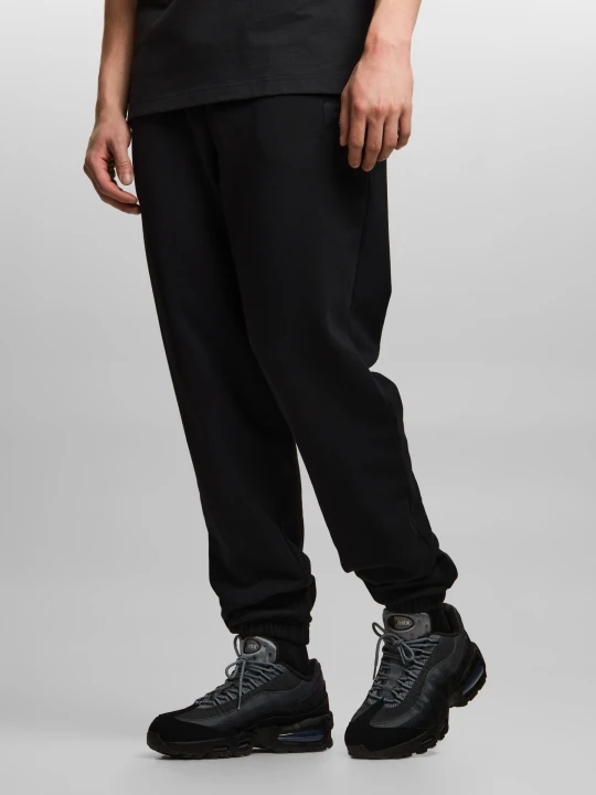 Zdjęcie produktu Jacquard Label spodnie dresowe oversize bawełniane czarne Klasyk