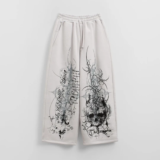 Zdjęcie produktu Jasnoszare spodnie baggy z kontrastowym nadrukiem w stylu tribal House jasnoszary