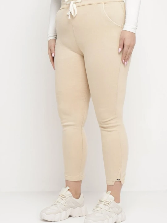 Zdjęcie produktu Jasnobeżowe Spodnie Skinny ze Sznurkiem w Pasie i Kieszeniami Irfana Queene Beżowy