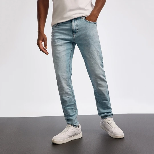 Zdjęcie produktu Jasnoniebieskie jeansy slim fit z efektem sprania House
