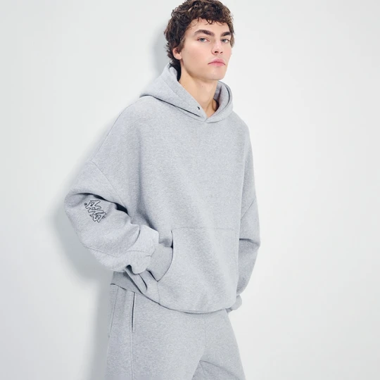 Zdjęcie produktu Jasnoszara bluza oversize z kapturem haftem w stylu graffiti House szary