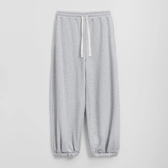 Zdjęcie produktu Jasnoszare spodnie dresowe super baggy House szary