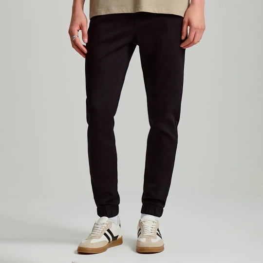 Zdjęcie produktu Jeansowe joggery z przetarciami czarne House