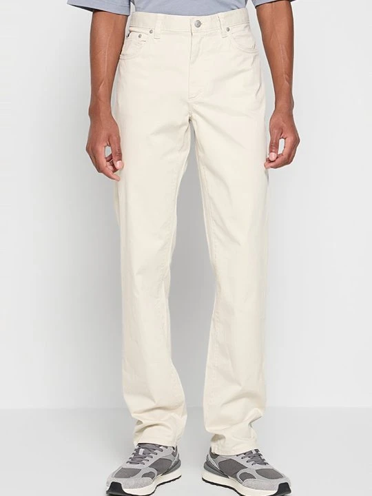 Zdjęcie produktu Jeansy Bootcut Tommy Hilfiger mleczny