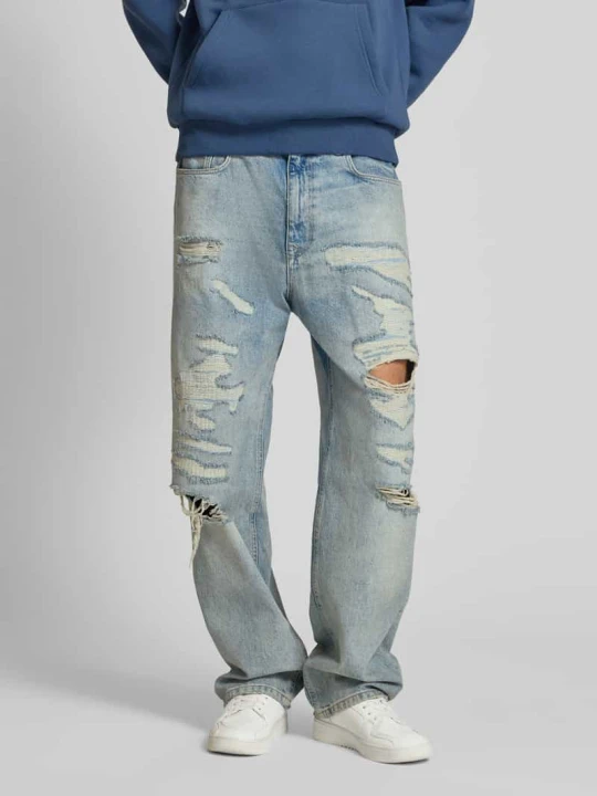 Zdjęcie produktu Jeansy o kroju baggy fit z przetarciami REVIEW Jasnoniebieski
