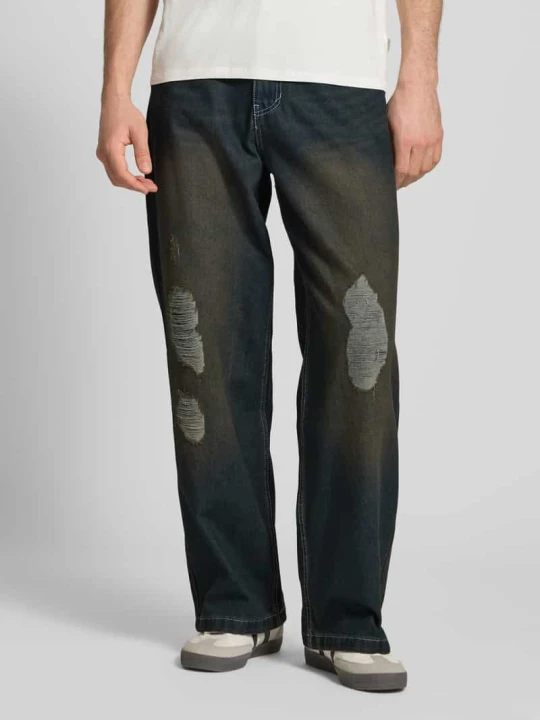 Zdjęcie produktu Jeansy o kroju relaxed baggy fit z przetarciami model ‘Distress’ Karl Kani Jeansowy niebieski