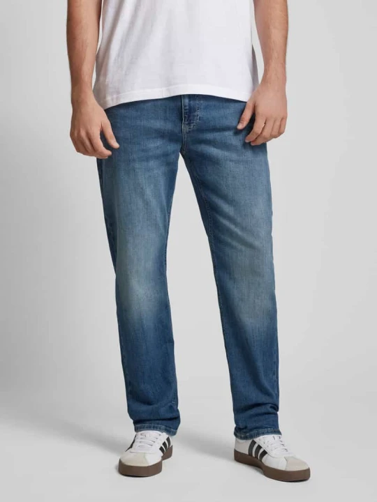Zdjęcie produktu Jeansy o kroju slim fit z 5 kieszeniami model ‘RYAN’ Tommy Jeans Jeansowy niebieski