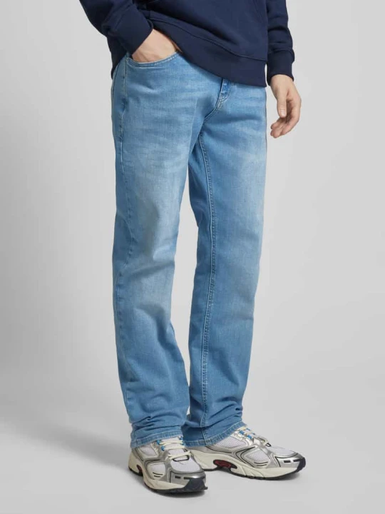 Zdjęcie produktu Jeansy o kroju slim fit z 5 kieszeniami model ‘RYAN’ Tommy Jeans Jasnoniebieski