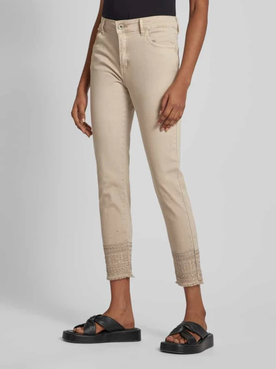 Zdjęcie produktu Jeansy o kroju Slim Fit z ozdobnych kamieni Miss Goodlife Beżowy
