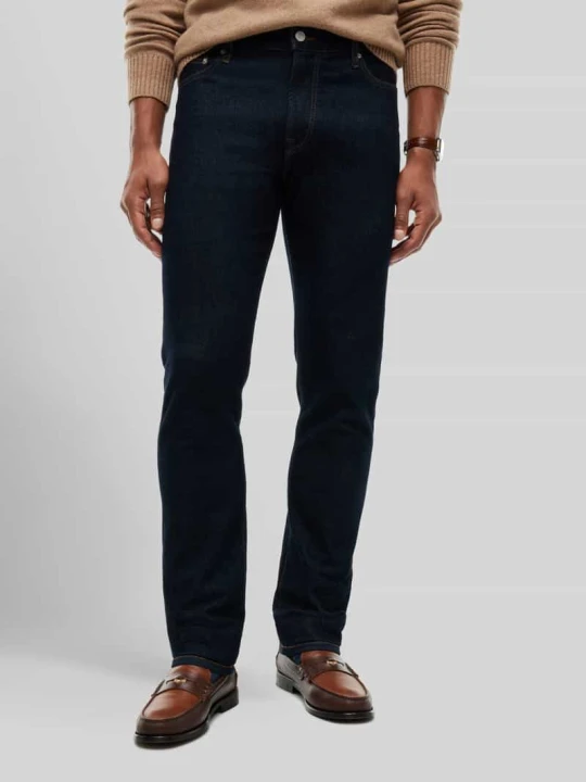 Zdjęcie produktu Jeansy o kroju straight fit z detalami z logo Tommy Hilfiger Niebieski