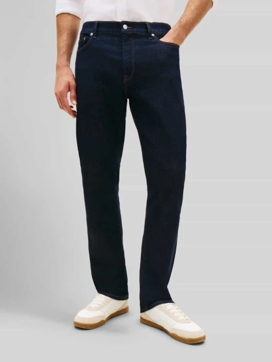 Zdjęcie produktu Jeansy o kroju regular fit z mieszanka bawełny, w 5 kieszeni, model 'DENTON' Tommy Hilfiger Ciemnoniebieski