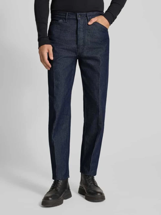 Zdjęcie produktu Jeansy o kroju tapered fit z czystej bawełny model ‘HUGO’ Jeansowy niebieski