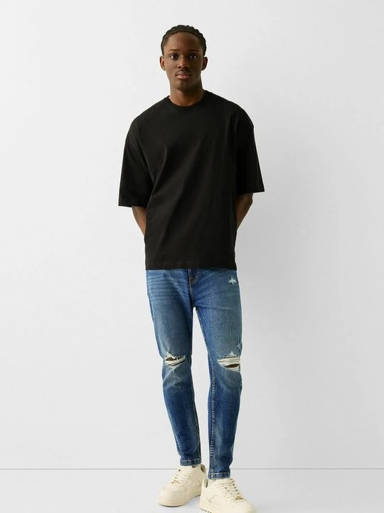 Zdjęcie produktu Jeansy Slim Fit Bershka niebieski denim