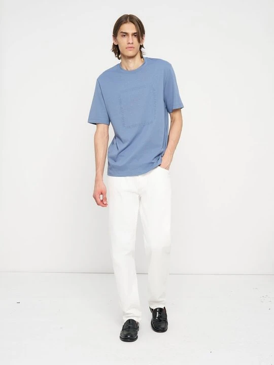 Zdjęcie produktu Jeansy Straight Leg Armani Exchange mleczny
