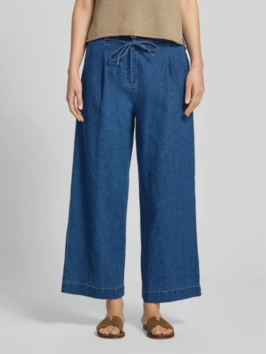 Zdjęcie produktu Jeansy typu wide leg z mieszanka lnu i bawełny z wiązany pasek Christian Berg Jeansowy niebieski melanż