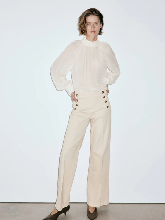 Zdjęcie produktu Jeansy wide leg z bocznymi guzikami piaskowy - Kobieta - MANGO