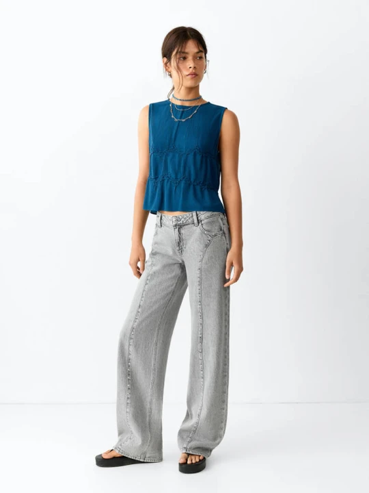 Zdjęcie produktu Jeansy wide leg z przeszyciami i ćwiekami szary denim - Teen - - MANGO TEEN
